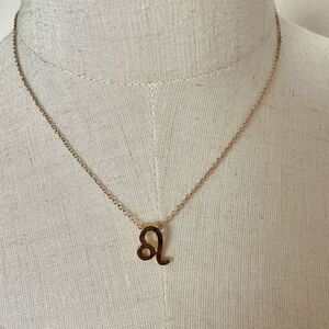 Leo zodiac sign gold tone pendant necklace